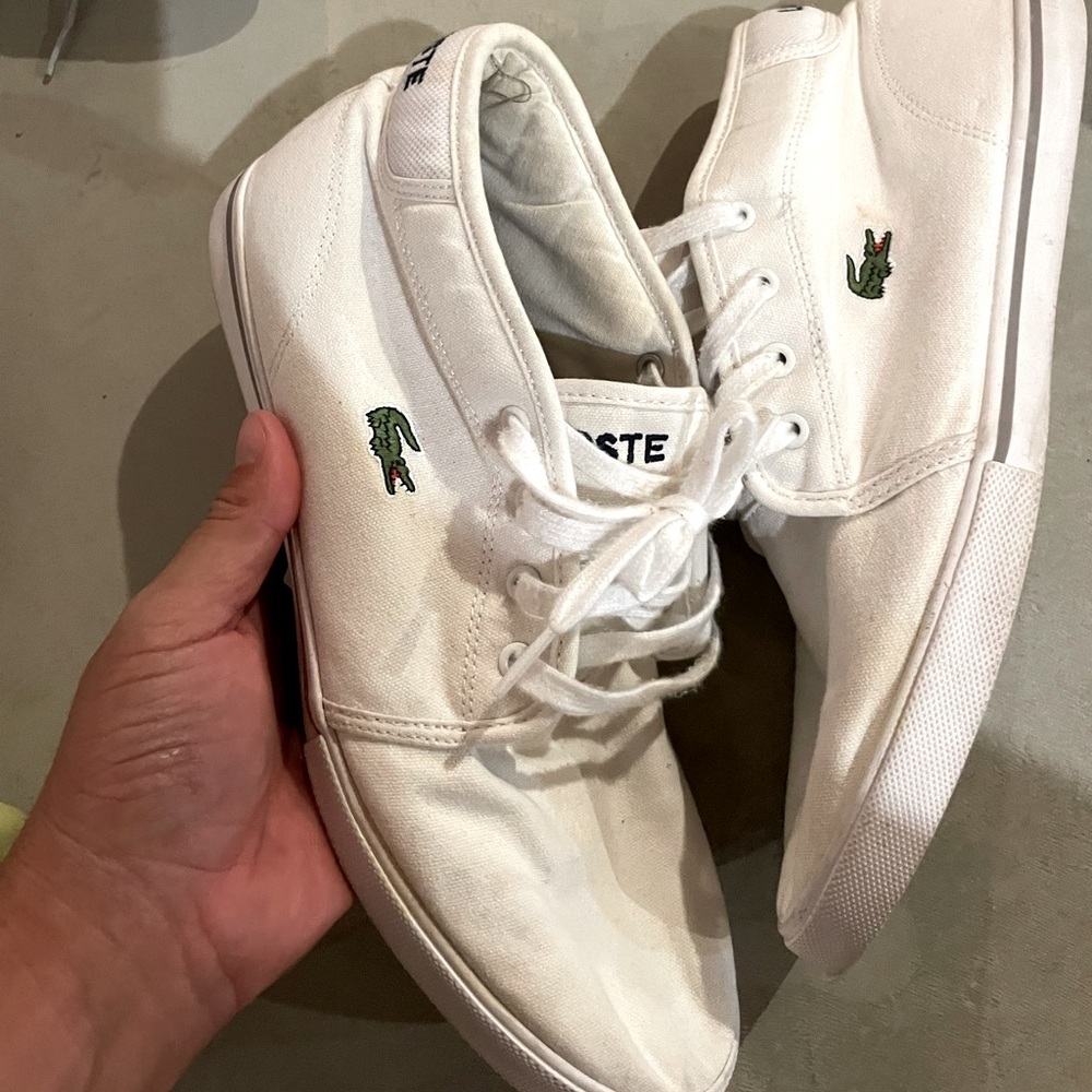 Lacoste mid top fabric white shoes.